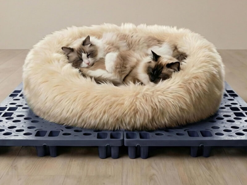 Romlits interlocking pet tiles inside a dog playpen and wire crate